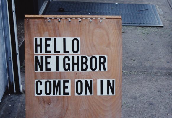 Image of sign with text Hello Neighbor Come on in